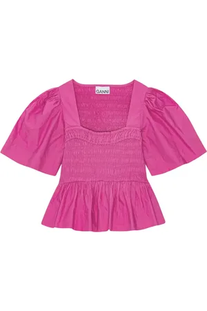 Ganni Blusa con cintura peplum