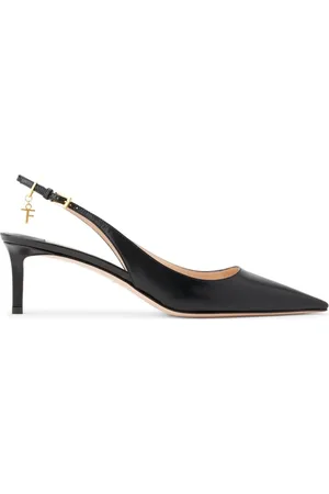 Tom Ford Zapatillas con tira trasera y dije del logo