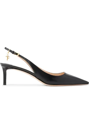 Tom Ford Zapatillas con tira trasera y dije del logo