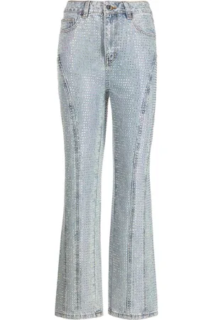 Self-Portrait Jeans acampanados con detalles
