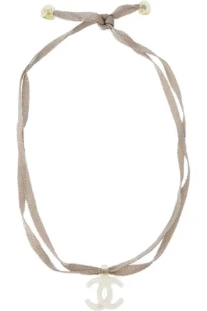 CHANEL Collar de tela transparente con logo CC 2002