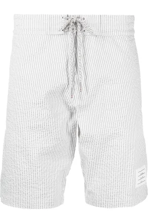 Thom Browne Shorts de playa con rayas estampadas