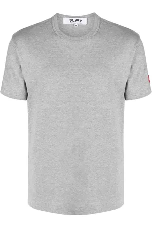 Comme des Garçons Playera con aplique pixelado de COMME DES GARÇONS PLAY x the Artist Invader