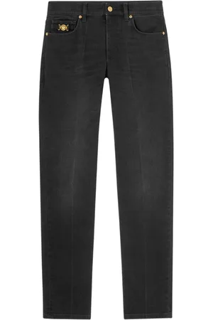 VERSACE Jeans slim con aplique Medusa Head