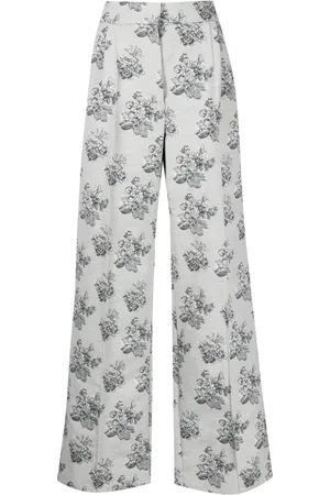 Maison Kitsuné Pantalones rectos con motivo floral en jacquard