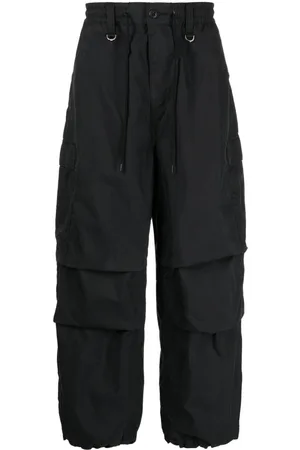 MASTERMIND Pantalones con logo estampado