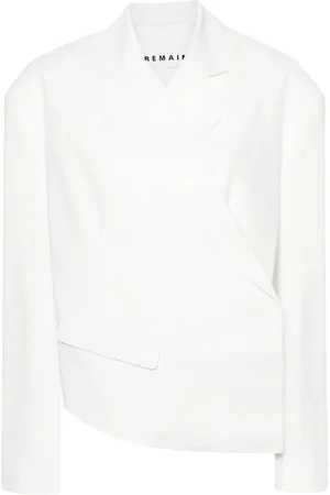 REMAIN Blazer asimétrico con doble botonadura