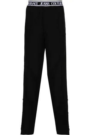 VERSACE Pantalones rectos con logo en la pretina