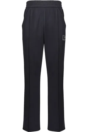 Giuseppe Zanotti Pants rectos con parche del logo