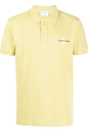 Calvin Klein Playera tipo polo manga corta con logo bordado