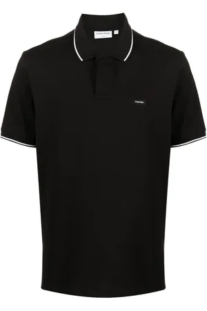 Calvin Klein Playera tipo polo manga corta con aplique del logo