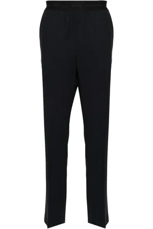 Msgm Pantalones de vestir con logo en la pretina