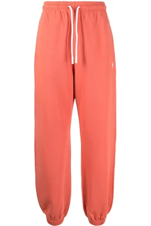 MARCELO BURLON Pants con logo bordado