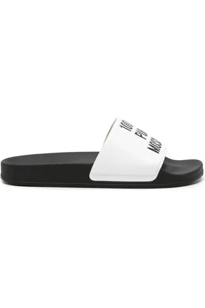 Moschino Flip flops con diseño en relieve