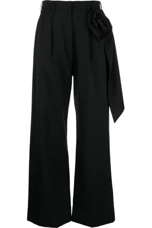 Simone Rocha Pantalones con aplique de rosa