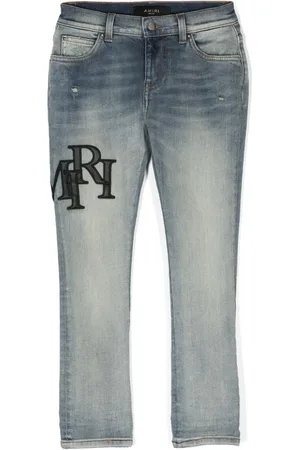 AMIRI Skinny jeans con apliques del logo