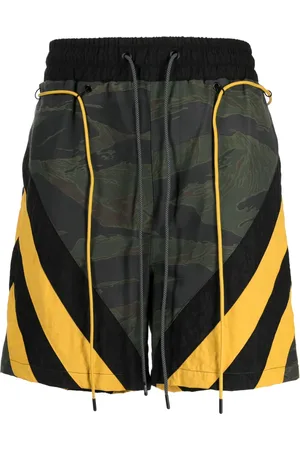 MOSTLY HEARD RARELY SEEN Shorts deportivos con motivo de rayas y estampado militar