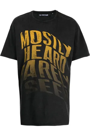 MOSTLY HEARD RARELY SEEN Playera con efecto desgastado