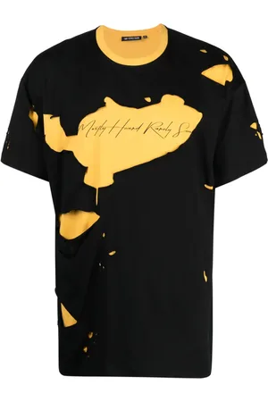 MOSTLY HEARD RARELY SEEN Playera con logo estampado y detalles rasgados