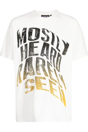 MOSTLY HEARD RARELY SEEN Playera con efecto desgastado
