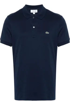 Lacoste Playera tipo polo con parche del logo