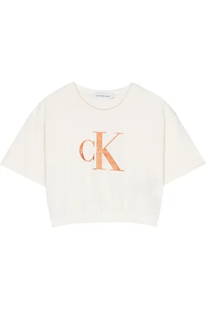 Calvin Klein Playera corta con monograma y glitter