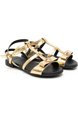 VERSACE Sandalias metalizadas con moño
