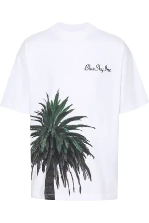 BLUE SKY INN Playera con palmeras estampadas