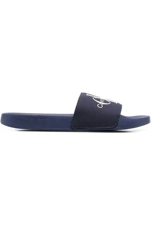 Calvin Klein Flip flops con monograma estampado