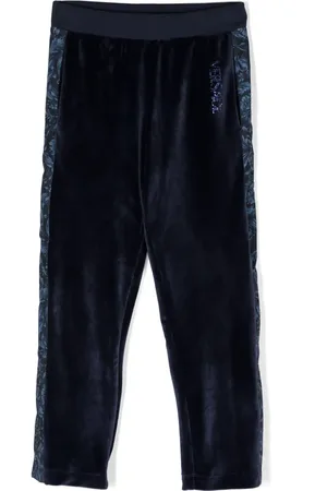 VERSACE Pantalones de terciopelo con estampado Barocco