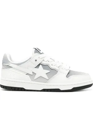 A Bathing Ape Tenis con efecto desgastado y aplique de estrella