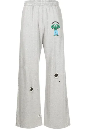 Natasha Zinko Pants con logo estampado