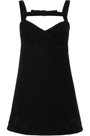 Patou Vestido corto de tweed con moño en el cuello