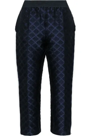 CHANEL Joggers con rayas laterales 2003