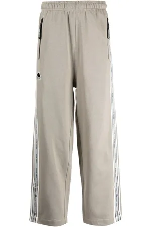 Izzue Pants con parche del logo