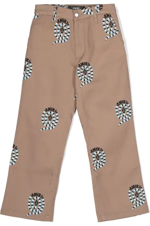 AMIRI Pantalones chino con estampado de piel de serpiente