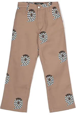 AMIRI Pantalones chino con estampado de piel de serpiente