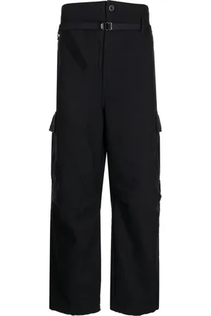 Comme des Garçons Pantalones anchos con bolsillos cargo