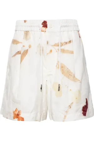 Feng Chen Wang Shorts con estampado abstracto y cordones en la pretina