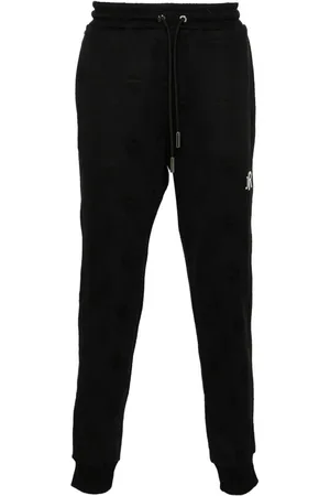 John Richmond Pantalones tapered con logo en jacquard