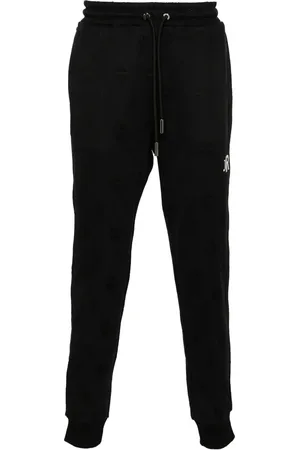John Richmond Pantalones tapered con logo en jacquard