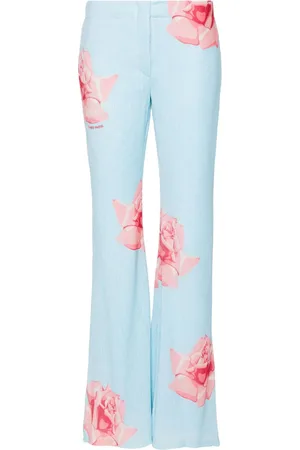 Kenzo Pantalones acampanados con rosas estampadas