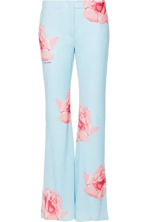 Kenzo Pantalones acampanados con rosas estampadas