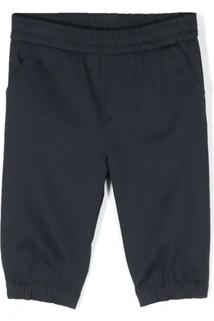 Moncler Pantalones tapered con aplique del logo