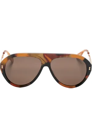 Gucci Lentes de sol con armazón navigator estilo carey
