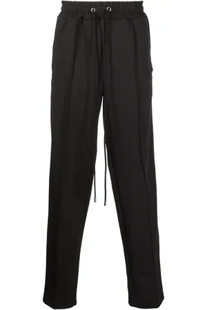 DOMREBEL Pants con franjas del logo