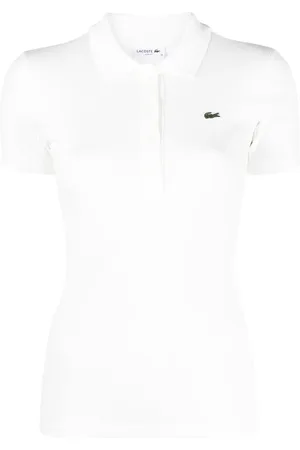 Lacoste Playera tipo polo con parche del logo