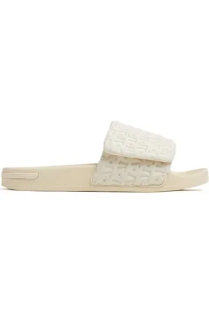 Mallet Flip flops con monograma en relieve