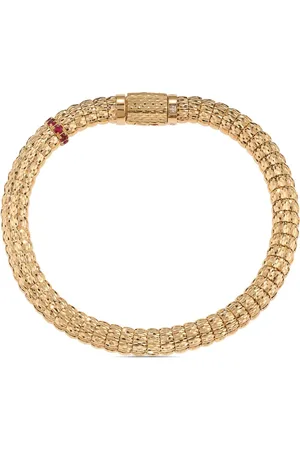 Officina Bernardi Pulsera Enigma en oro amarillo de 18kt con rubíe