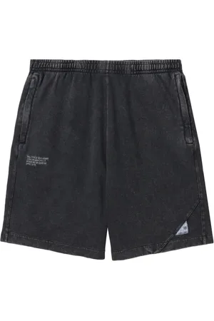 Izzue Shorts con parche del logo